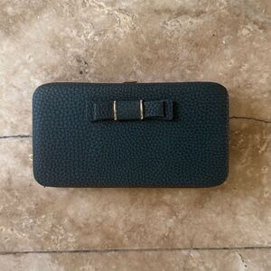 Ladies, genuine, leather wallet, brand new, never used in wristlet